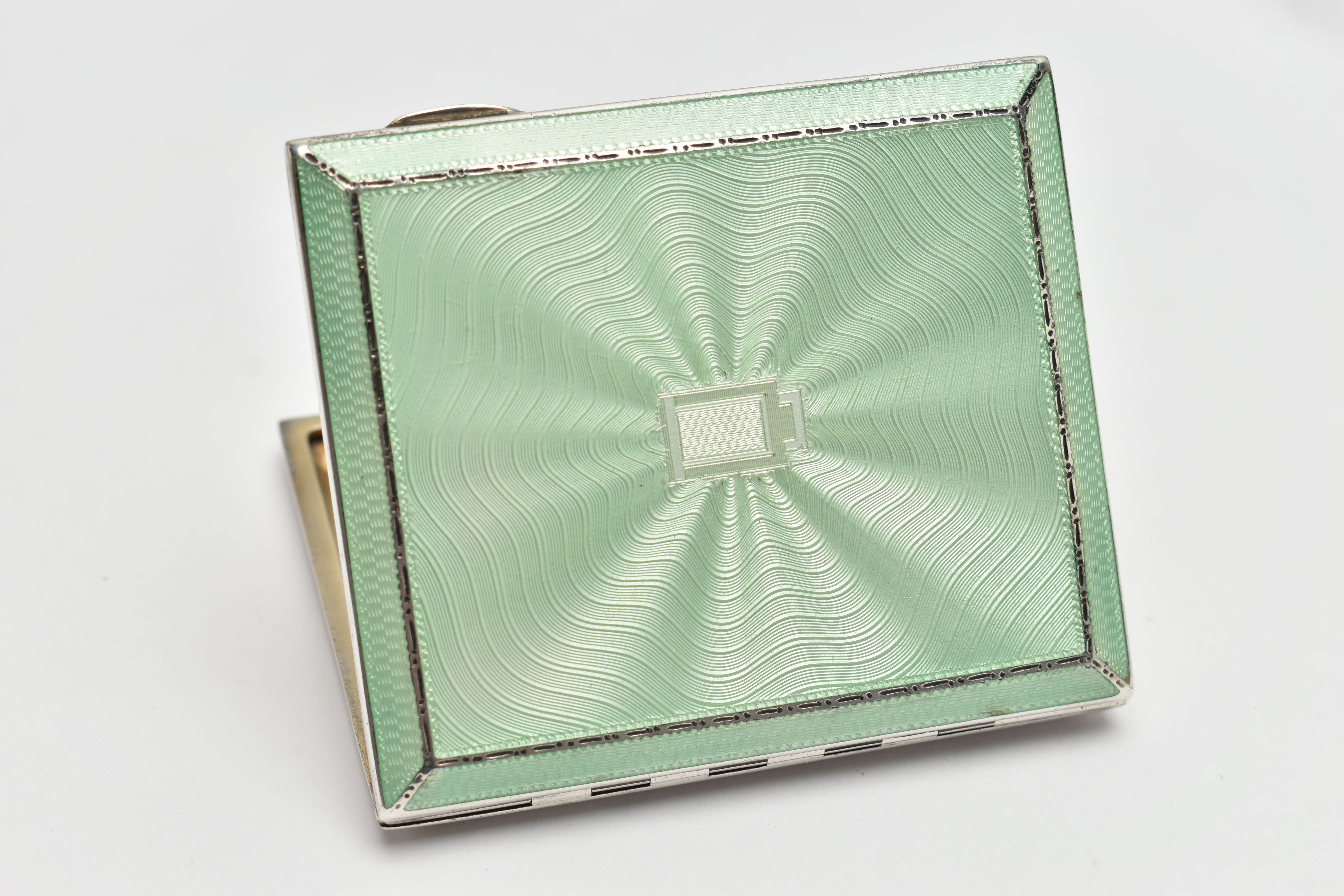 A SILVER AND GUILLOCHE ENAMEL CIGARETTE CASE, rectangular form case, mint green guilloche enamel