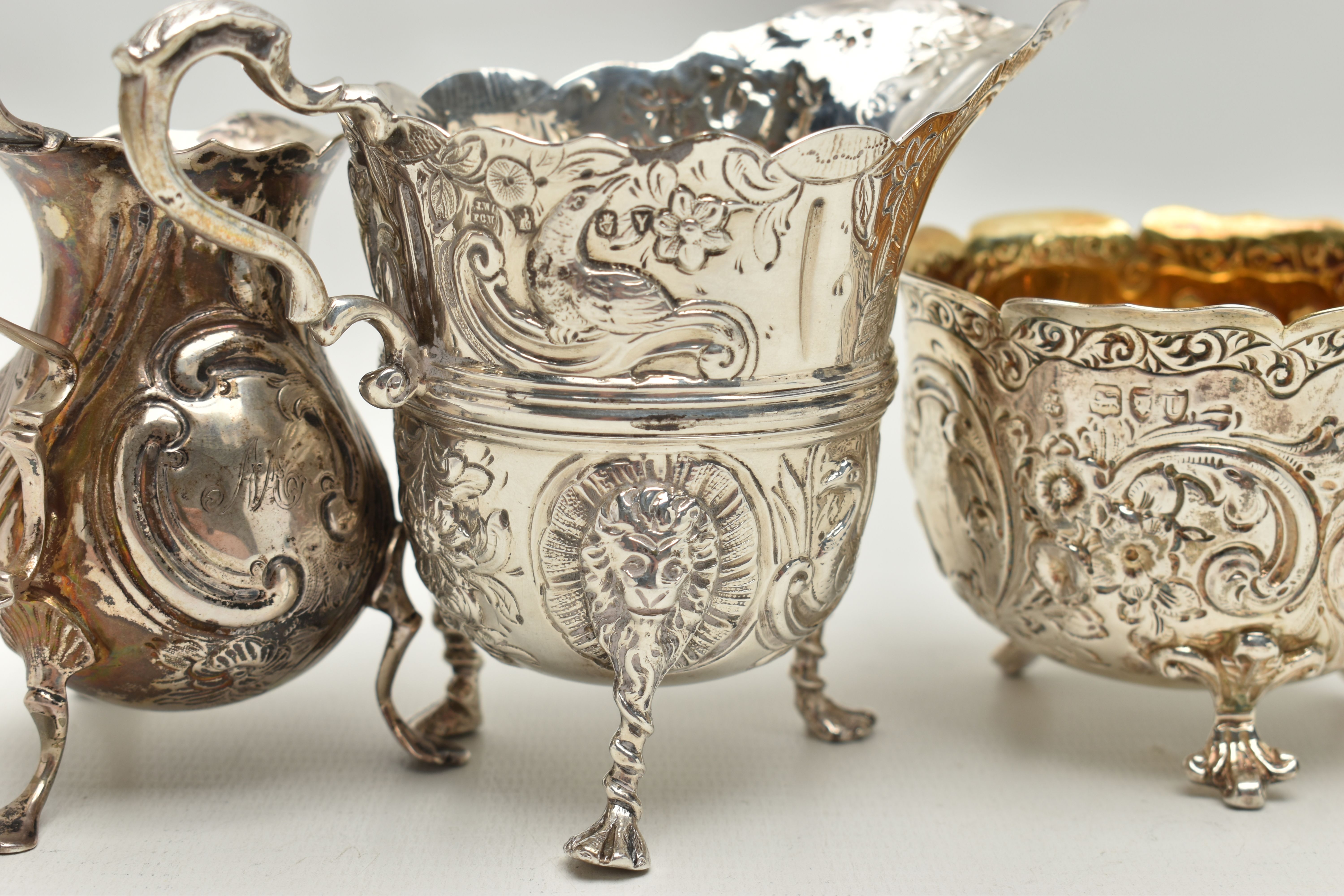 THREE PIECES OF SILVER, to include a George II creamer, embossed floral pattern with engraved - Image 7 of 7