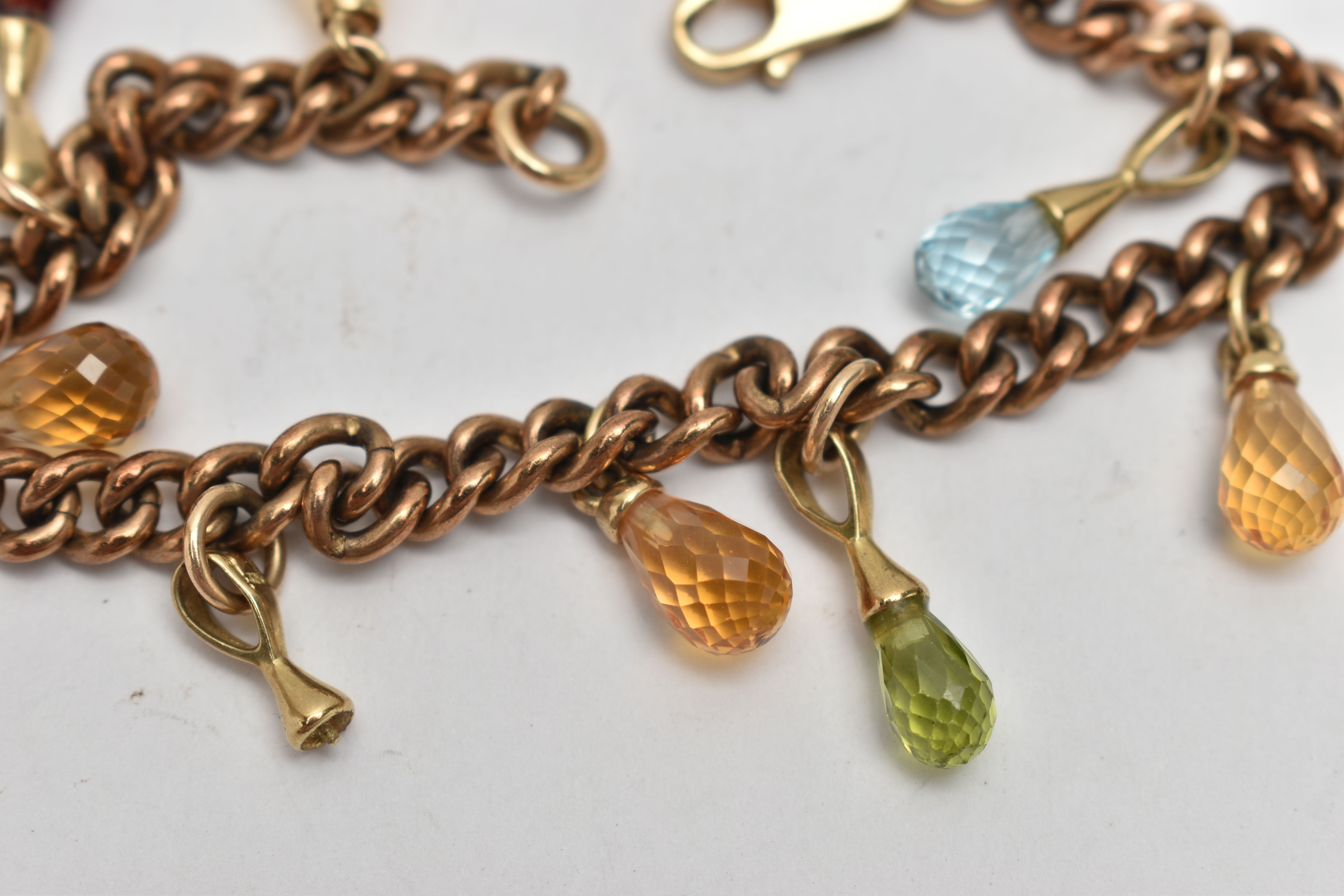 A YELLOW METAL GEM SET BRACELET, a rose metal curb link bracelet, fitted with eight semi-precious - Image 2 of 3