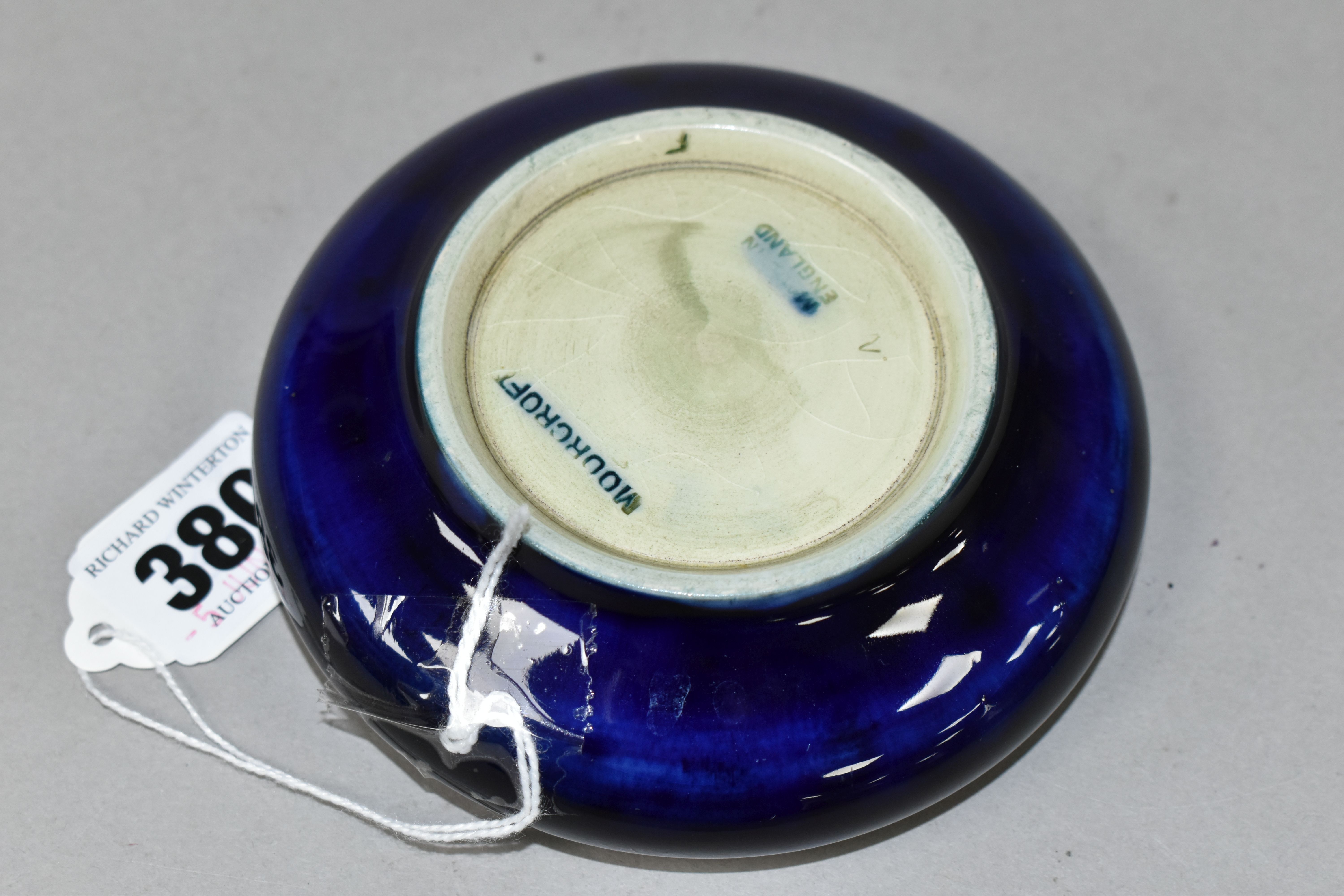 A MOORCROFT POTTERY 'ORCHID' PATTERN BOWL, tube lined with a purple and pale yellow orchid on a - Image 3 of 3