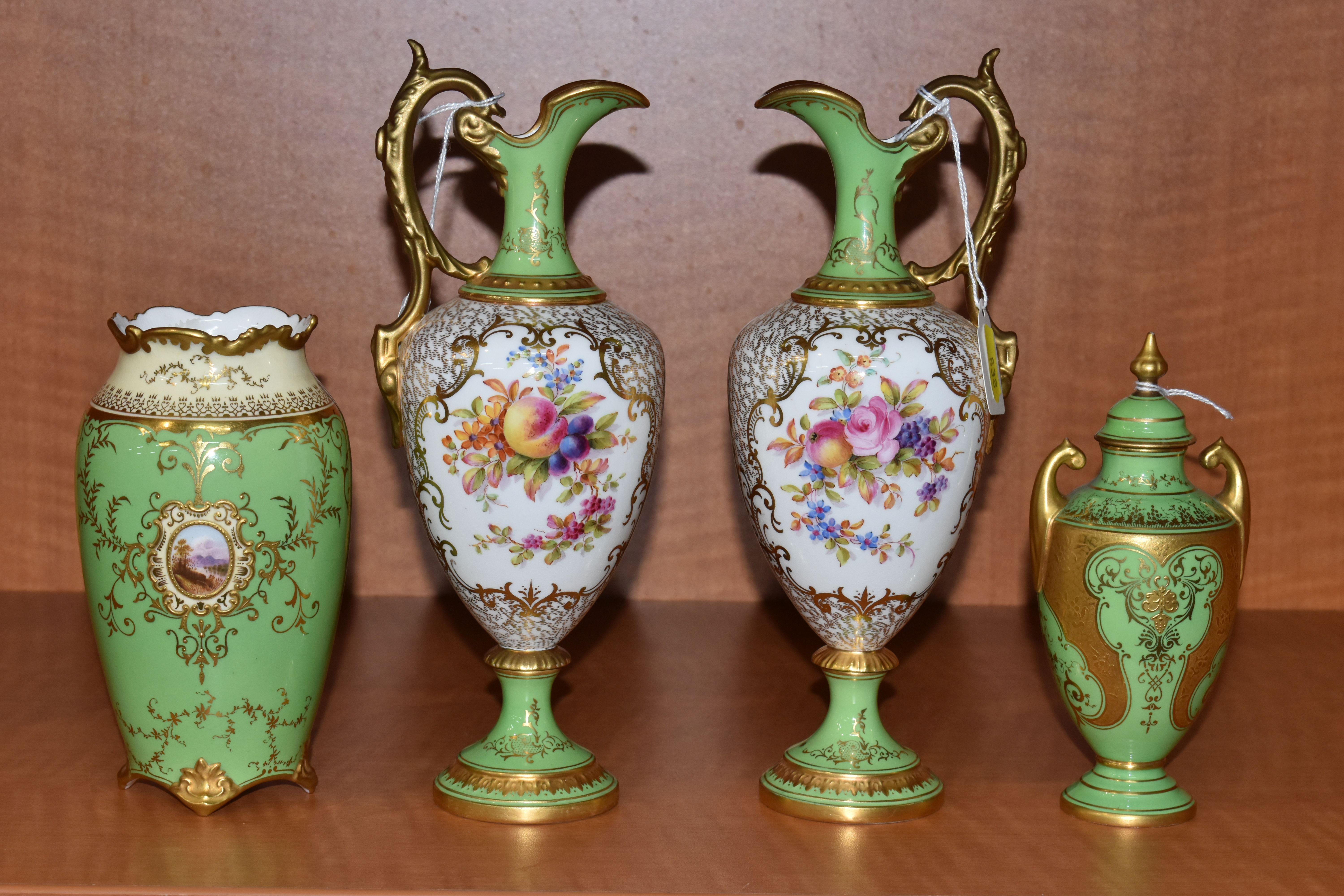FOUR EARLY 20TH CENTURY COALPORT GREEN AND GILT GROUND EWERS AND VASES, comprising a pair of - Image 3 of 14