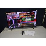 A HISENSE H43M3000 43in SMART TV with remote and manuals (PAT pass and working)