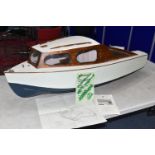 A SECOND HALF 20TH CENTURY MODEL OF A TWO BIRTH CABIN CRUISER -NOMAD, the model features in an
