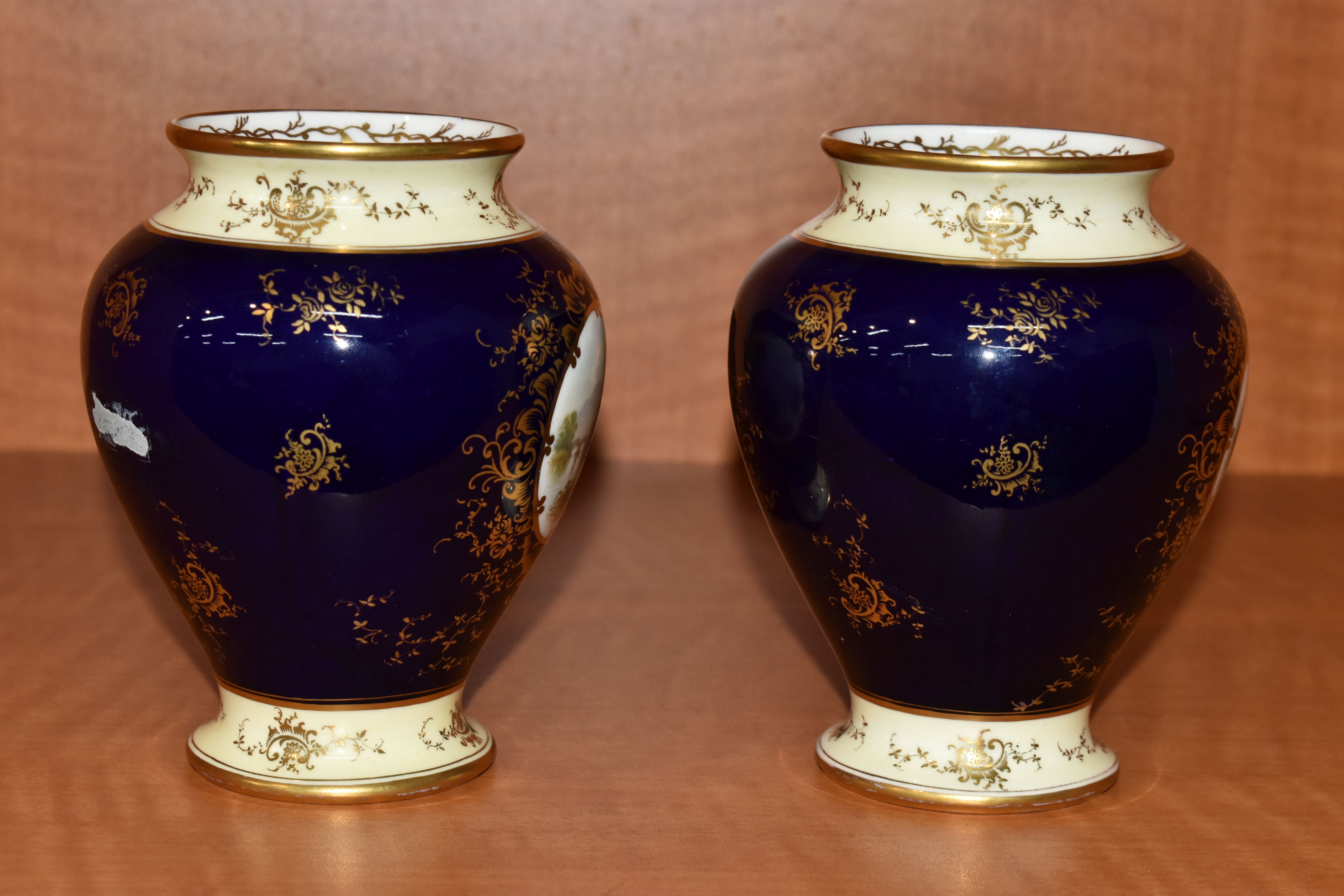 A PAIR OF LATE 19TH / EARLY 20TH CENTURY COALPORT BALUSTER VASES, blue, pale yellow and gilt - Image 4 of 9