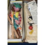 A BOXED PELHAM PUPPET COWGIRL, AND A SMALL MICKEY MOUSE STRING PUPPET, both of painted wood