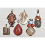 SIX STATEMENT PENDANTS, a selection of white metal pendants set with goldstone, agate, hardstone and