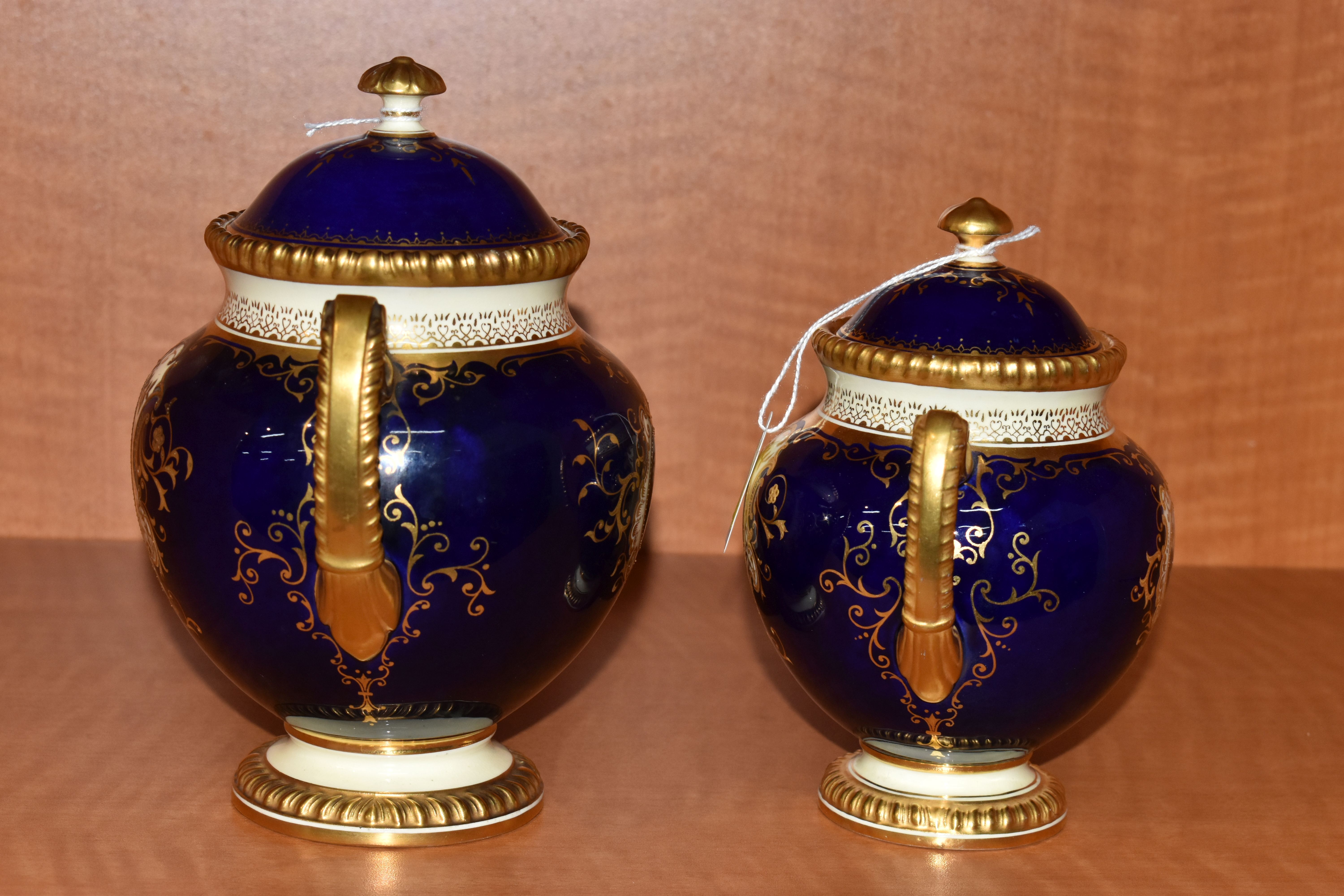 TWO EARLY 20TH CENTURY COALPORT TWIN HANDLED VASES AND COVERS, blue, pale yellow and gilt ground, - Image 8 of 12