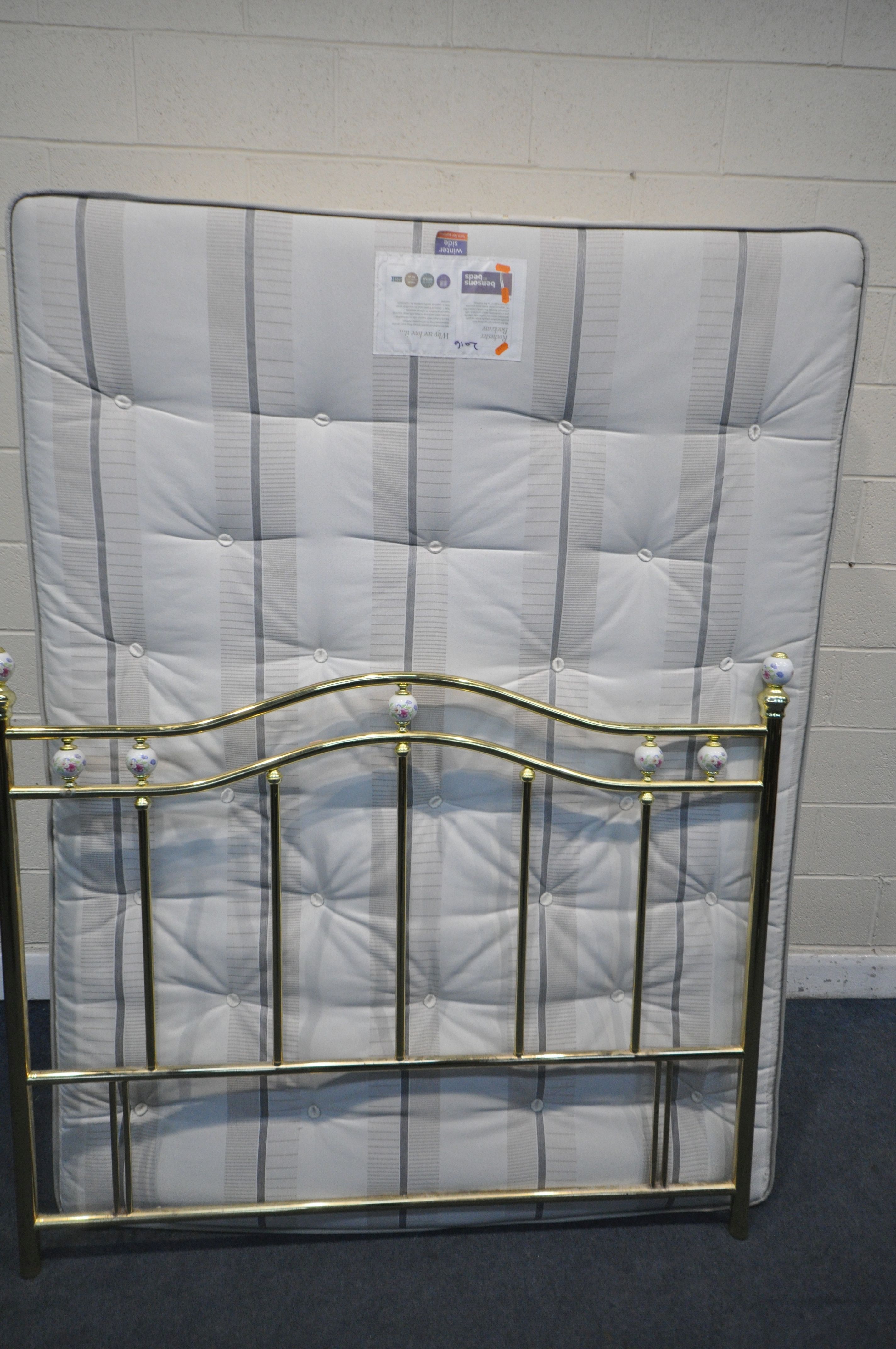 A 5FT DIVAN BED WITH A BENSONS FOR BEDS MATTRESS, and brass headboard