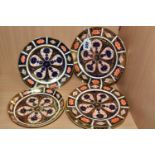 SIX ROYAL CROWN DERBY IMARI 1128 PLATES, comprising one 18cm plate, four 15cm plates with slightly