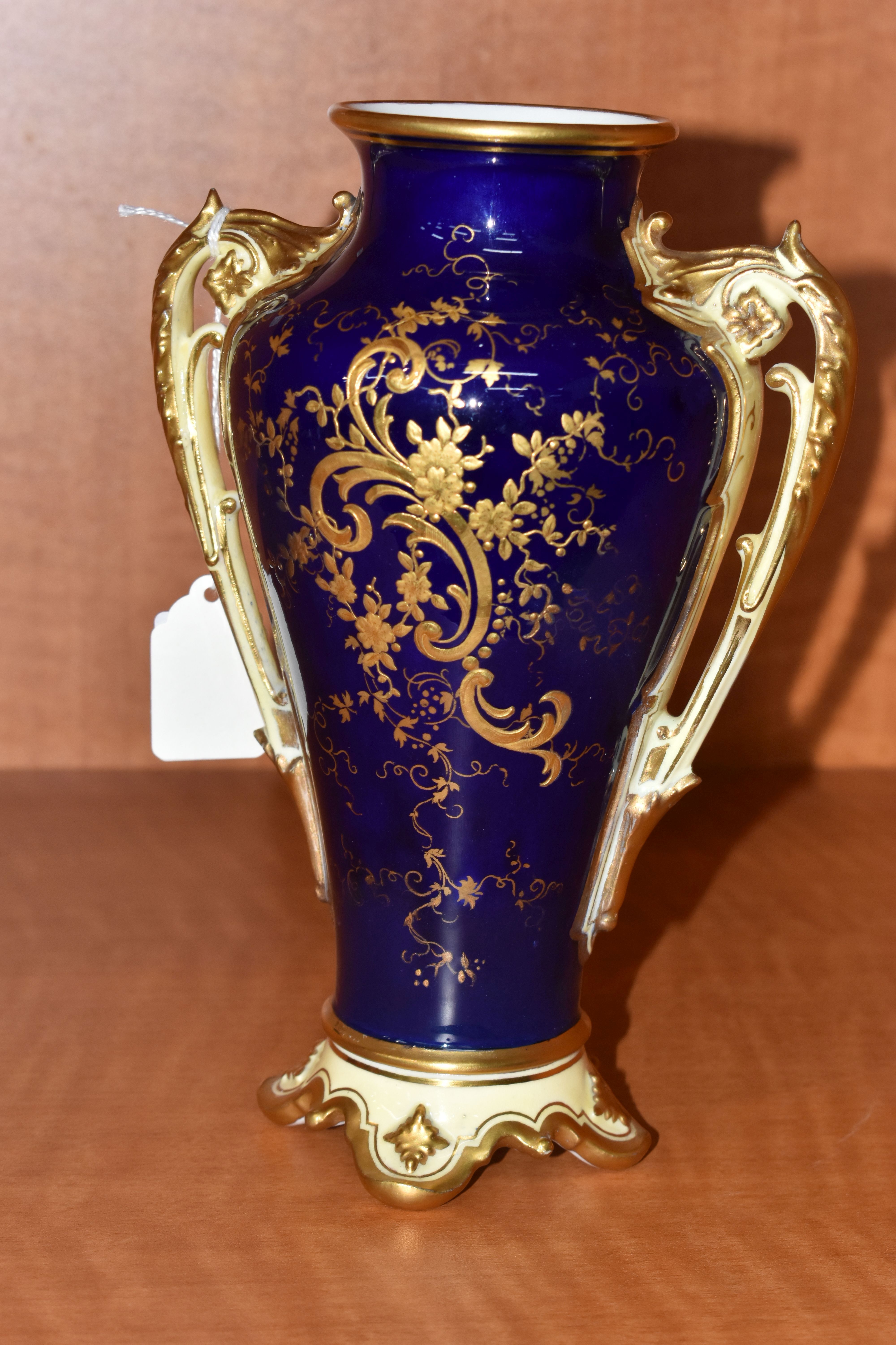 A LATE 19TH / EARLY 20TH CENTURY COALPORT TWIN HANDLED VASE, the blue, pale yellow and gilt ground - Image 4 of 7