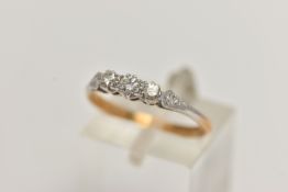 A THREE STONE DIAMOND RING, three round brilliant cut diamonds, prong set in white metal leading