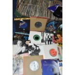 A BOX OF VINYL SINGLES, over three hundred records, artists to include Elvis Presley, Pet Shop Boys,