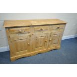 A MODERN PINE SIDEBOARD, with three drawers, over three doors width 149cm x depth 43cm x height 86cm