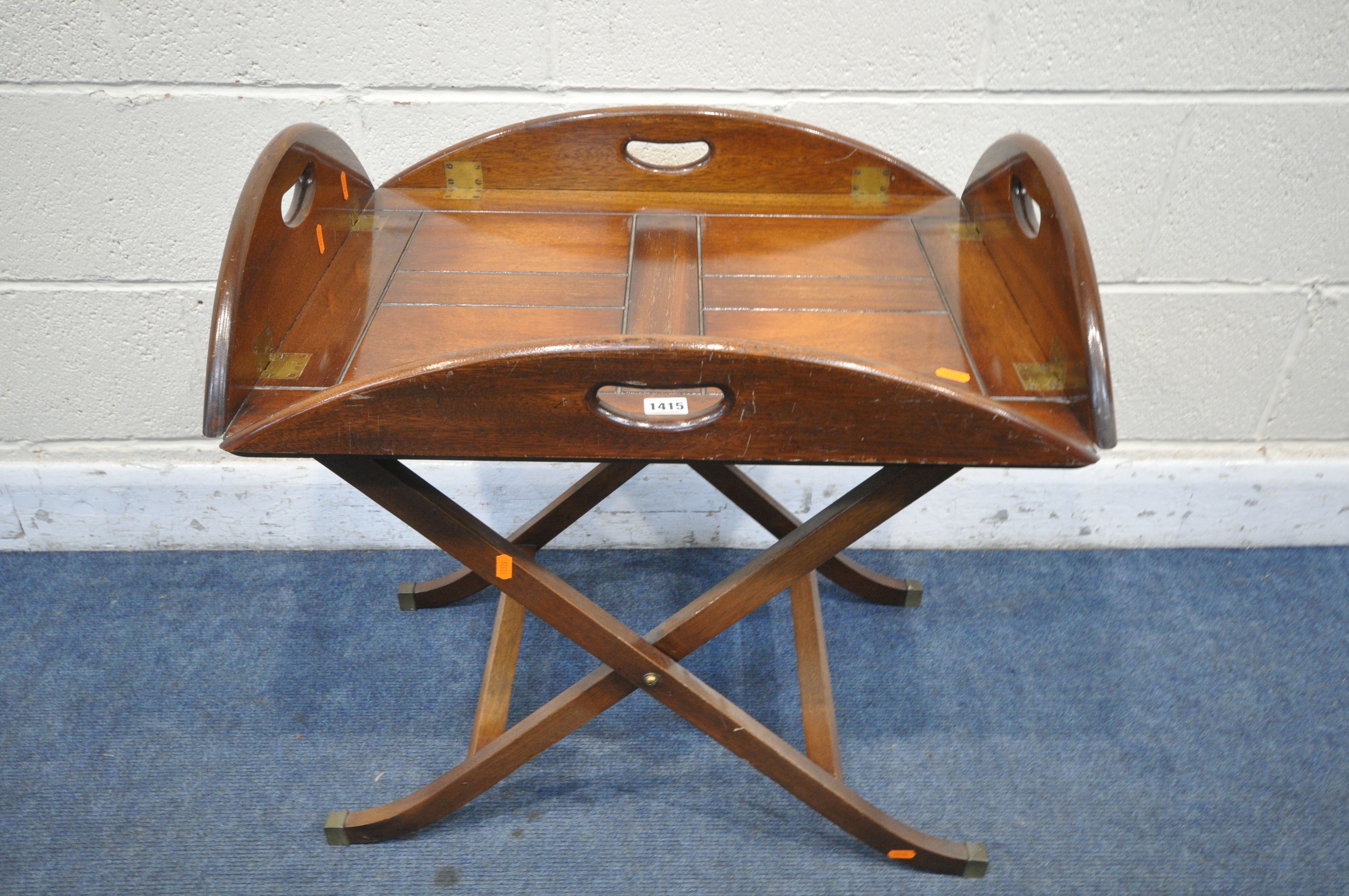 A MAHOGANY BUTLERS TRAY, with hinged sides on a folding base (condition:- surface scratches) - Image 2 of 2