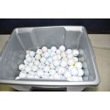 A PLASTIC BOX CONTAINING USED GOLFBALLS by Maxfli, Titleist, Callaway, Dunlop, etc