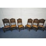 A SET OF SIX REPRODUCTION OAK DINING CHAIRS, with carved back of flower heads, a fielded panel