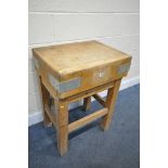 A 20TH CENTURY BUTCHERS BLOCK, on a loose pine stand, width 62cm x depth 47cm x height 84cm (