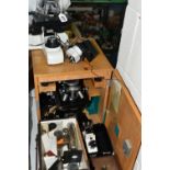 FOUR VINTAGE MICROSCOPES, comprising a PZO Warszawa research microscope model MB 8 in a wooden case,