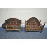 TWO CAST IRON FIRE GRATES, two different shaped but both with matching motif to back panel,