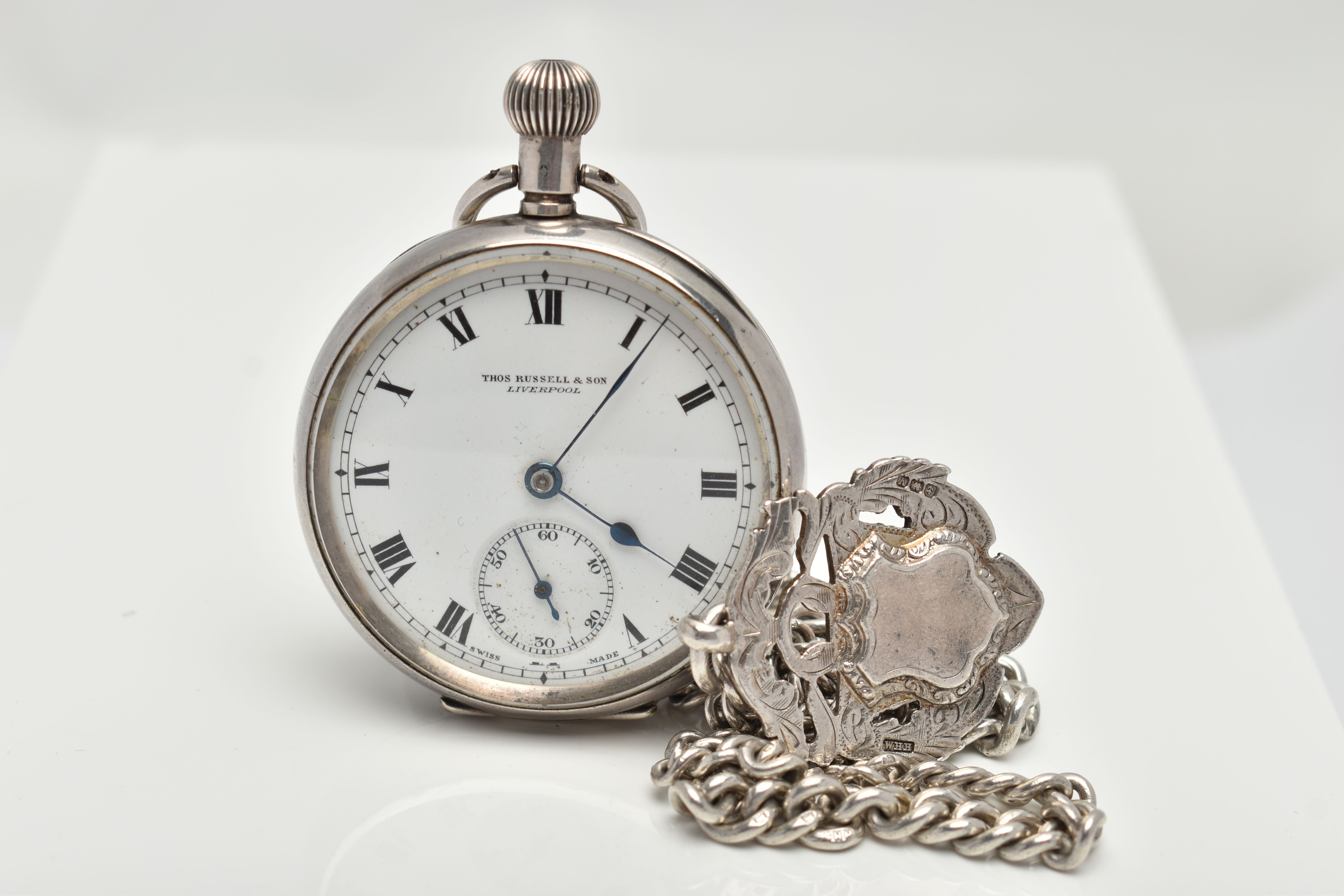 AN EARLY 20TH CENTURY SILVER OPEN FACE POCKET WATCH, hand wound movement, round white dial signed '