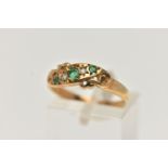 A 9CT GOLD EMERALD AND DIAMOND RING, set with three circular cut emeralds, interspaced with two star