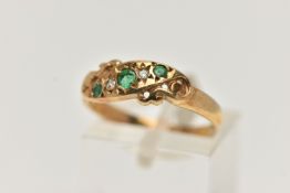 A 9CT GOLD EMERALD AND DIAMOND RING, set with three circular cut emeralds, interspaced with two star