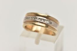 A 9CT GOLD WIDE BAND RING, bi-colour wide band, set with a row of channel set single cut diamonds,
