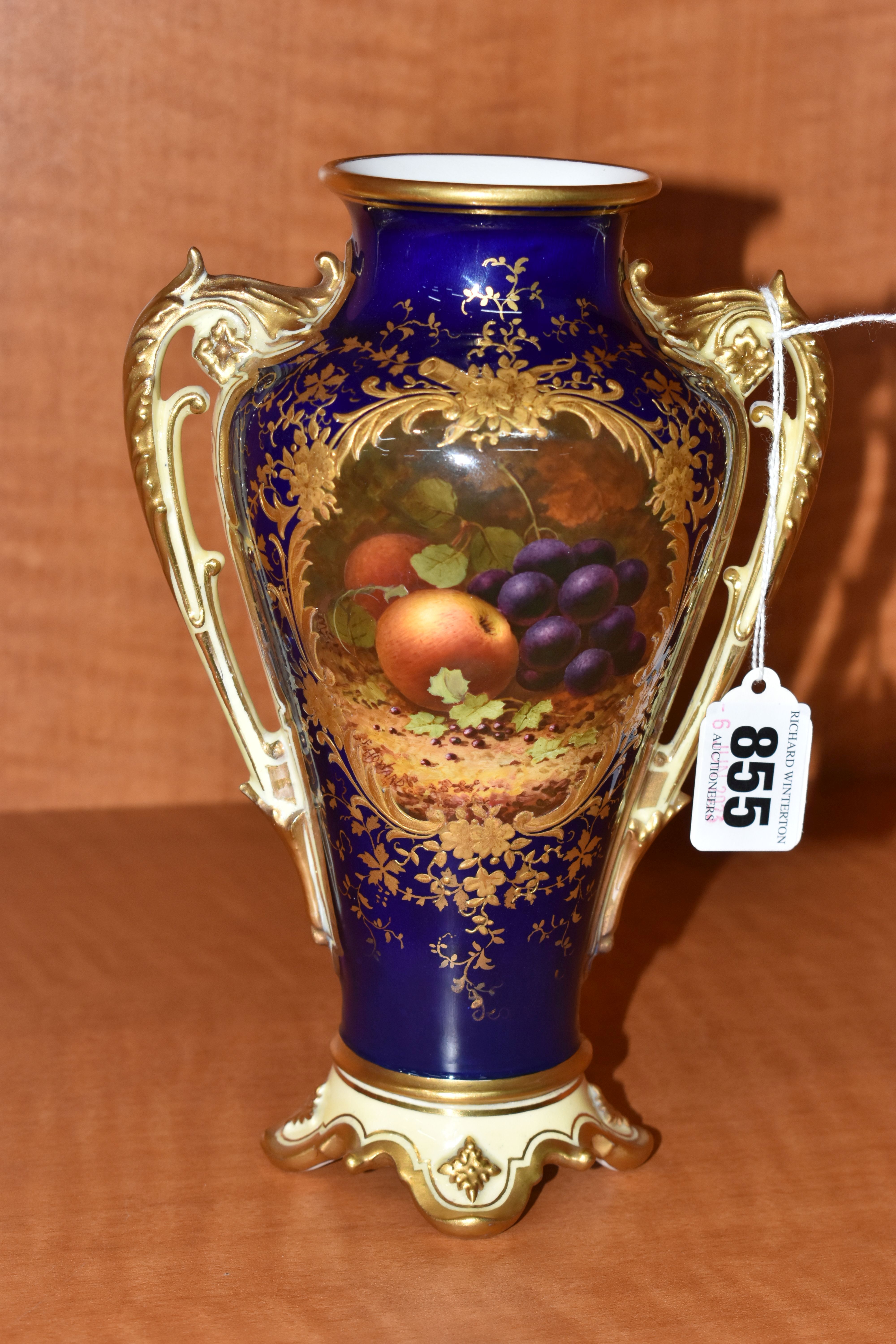 A LATE 19TH / EARLY 20TH CENTURY COALPORT TWIN HANDLED VASE, the blue, pale yellow and gilt ground