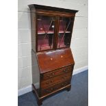 AN EDWARDIAN MAHOGANY AND CROSSBANDED BUREAU BOOKCASE, of smaller proportions, with double glazed