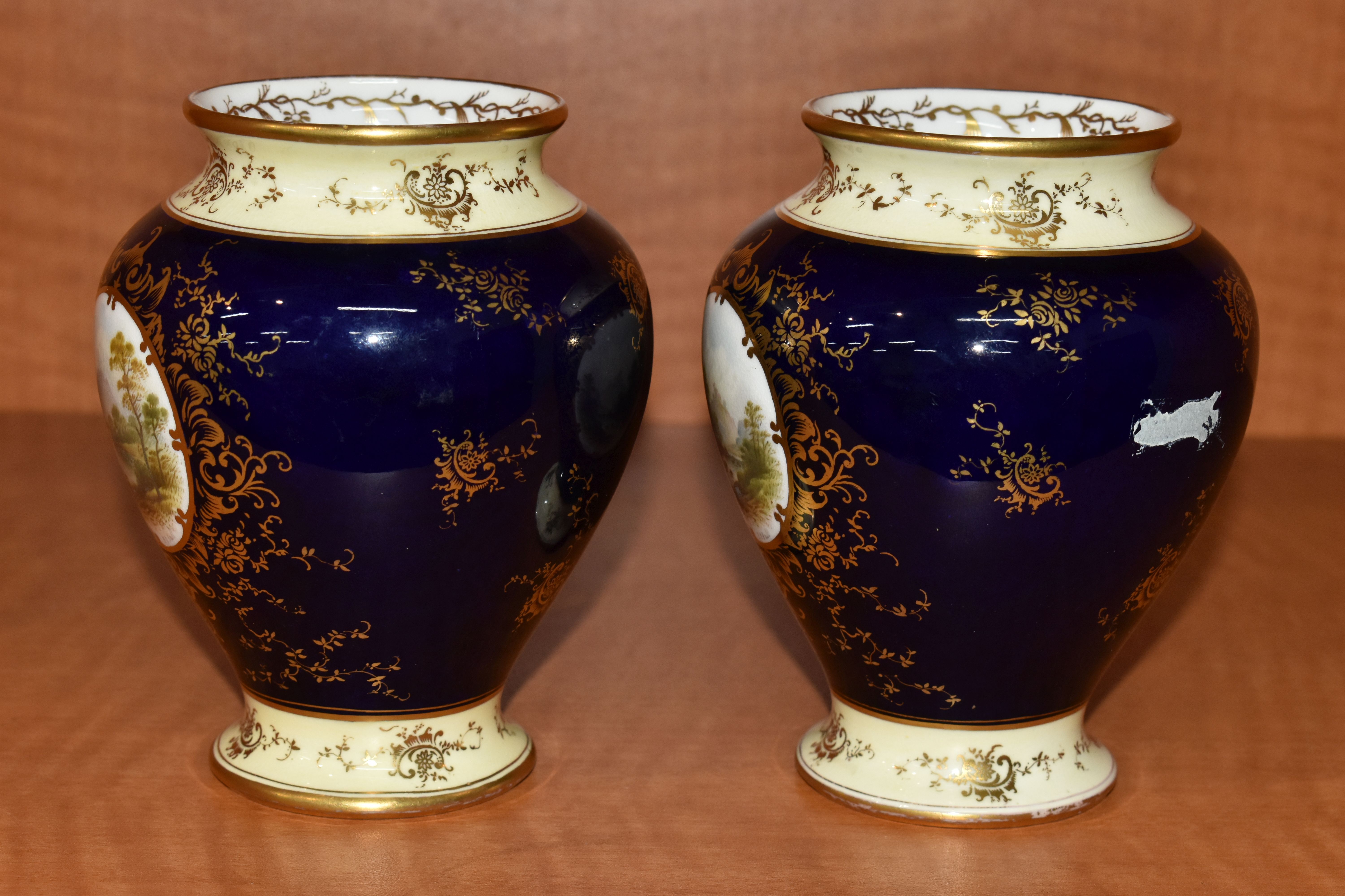 A PAIR OF LATE 19TH / EARLY 20TH CENTURY COALPORT BALUSTER VASES, blue, pale yellow and gilt - Image 7 of 9