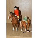 A BESWICK BOY ON PONY, PALOMINO GLOSS, MODEL NO. 1500 AND A BESWICK HUNTSMAN, STYLE TWO, BROWN