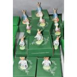 ELEVEN BOXED BESWICK BEATRIX POTTER FIGURES, comprising three x Peter and the Red Pocket