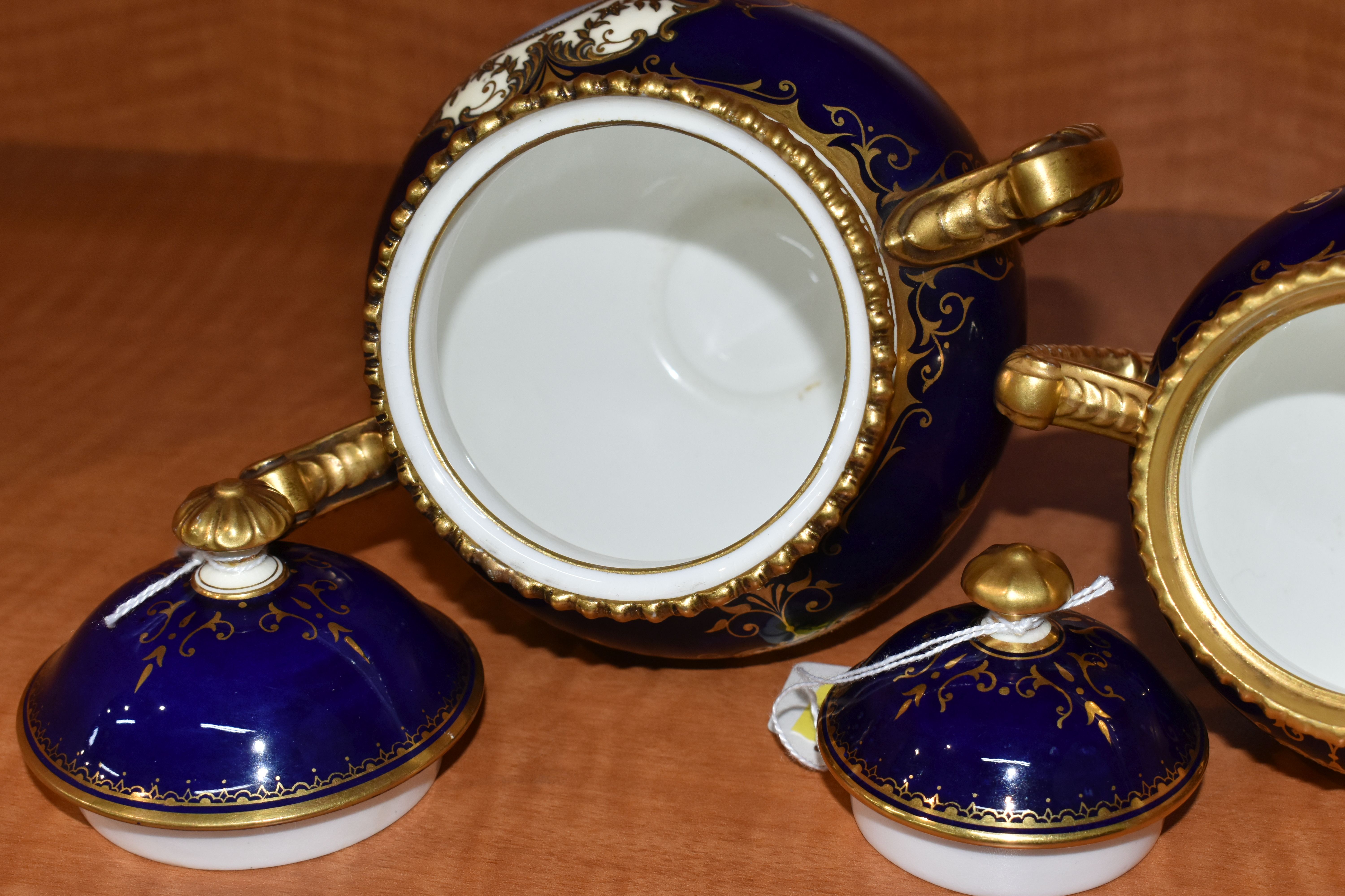 TWO EARLY 20TH CENTURY COALPORT TWIN HANDLED VASES AND COVERS, blue, pale yellow and gilt ground, - Image 9 of 12