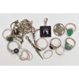 AN ASSORTMENT OF WHITE METAL JEWELLERY, to include nine rings, some gem set, a brooch, two pendants,