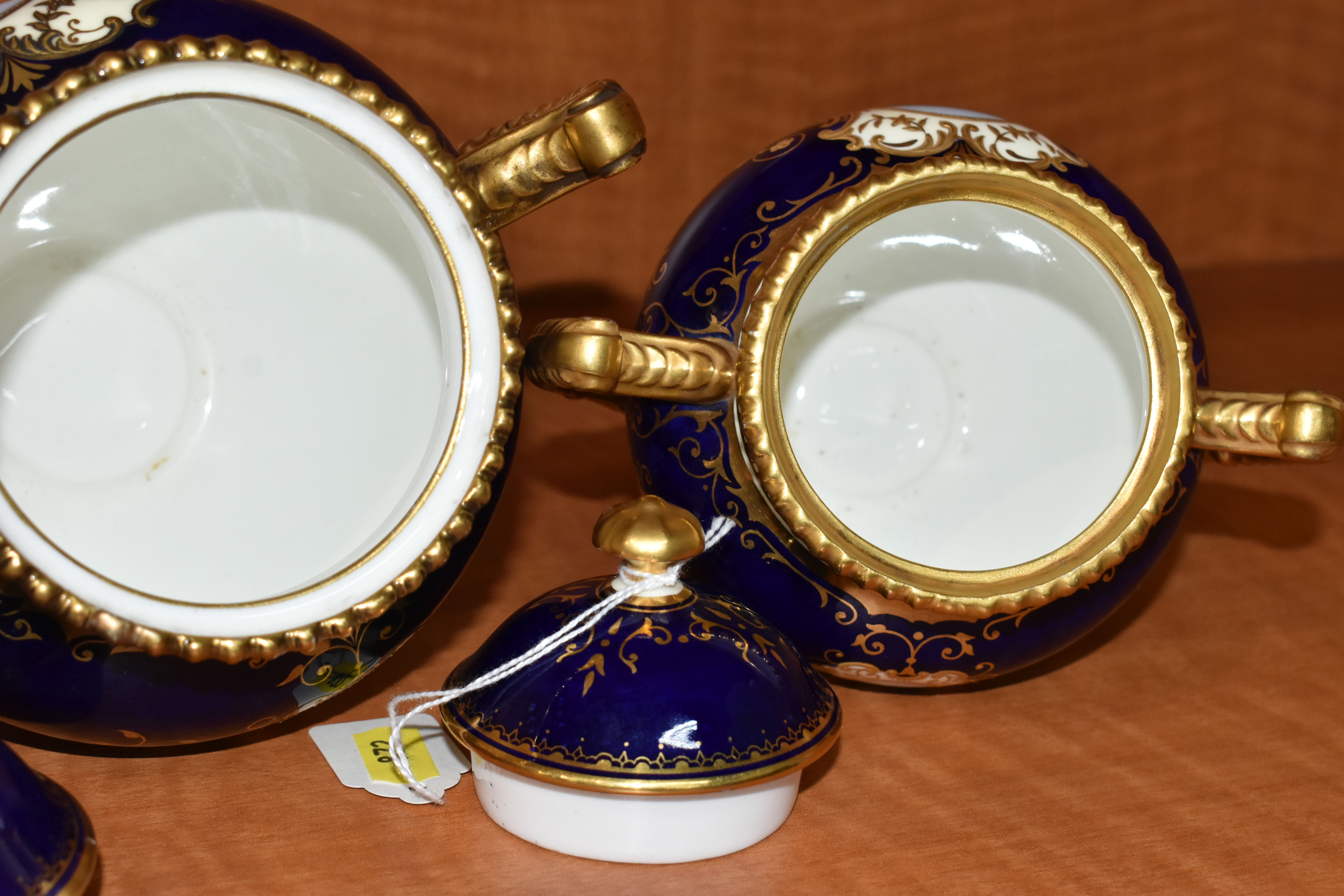 TWO EARLY 20TH CENTURY COALPORT TWIN HANDLED VASES AND COVERS, blue, pale yellow and gilt ground, - Image 10 of 12