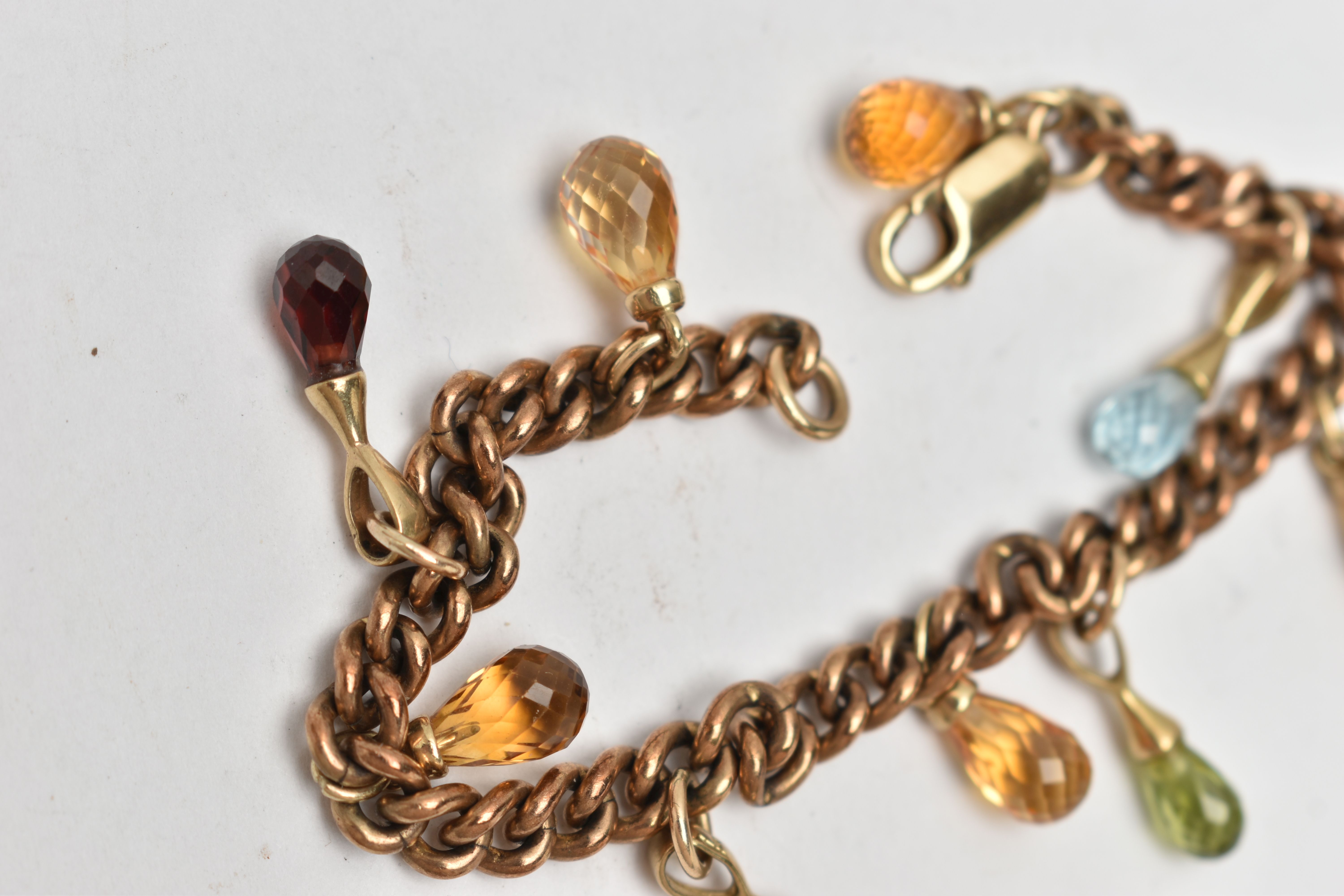 A YELLOW METAL GEM SET BRACELET, a rose metal curb link bracelet, fitted with eight semi-precious - Image 3 of 3