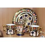 FOUR PIECES OF ROYAL CROWN DERBY IMARI WARES, comprising two 1128 pattern loving cups, a 6299