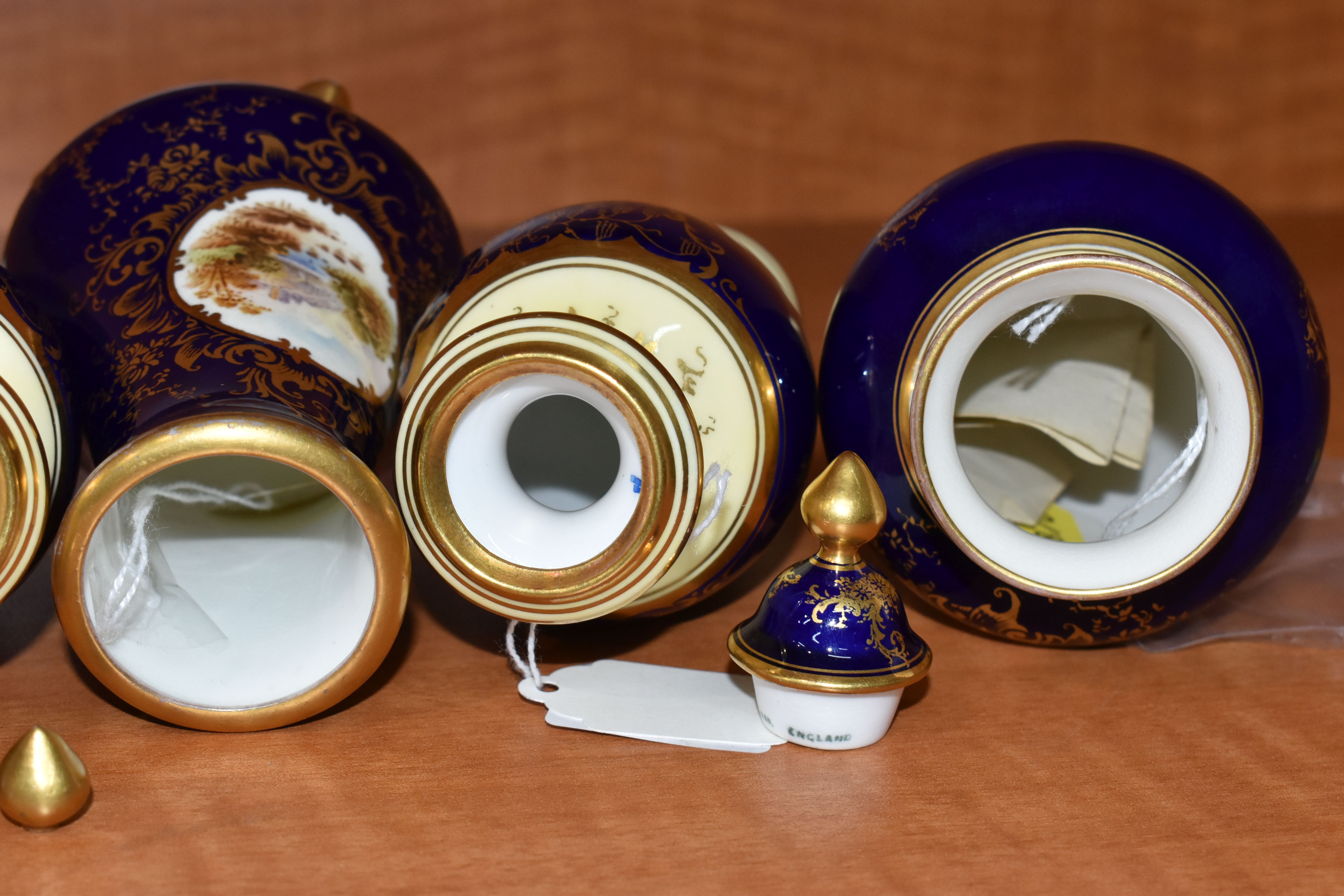 FIVE EARLY 20TH CENTURY COALPORT VASES, all blue and gilt ground, four with pale lemon borders, - Image 11 of 13