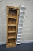 A SLIM MODERN PINE OPEN BOOKCASE, width 49cm x depth 24cm x height 182cm, and white painted open