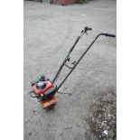 A HONDA 4 STROKE PETROL GARDEN ROTAVATOR (engine pulls freely)