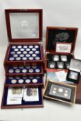 A BOXED DISPLAY OF AMERICAN SILVER DOLLAR COINS, to include five different finishes genuine