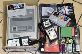 NINTENDO SNES CONSOLE AND GAMES, includes The Adams Family Pugsley's Scavenger Hunt (boxed with