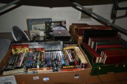 FOUR BOXES OF BOOKS, DVDS AND SUNDRY ITEMS RELATING TO WAR, to include over forty war films and