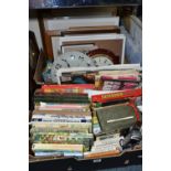 TWO BOXES OF BOOKS, PICTURES, EPHEMERA AND CLOCKS, to include six 1970s Rupert annuals, four Beatrix