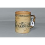 A DOULTON LAMBETH STONEWARE TANKARD BY HANNAH BARLOW, incised with pigs and piglets beneath a