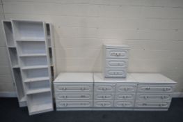 A SELECTION OF MODERN WHITE BEDROOM FURNITURE, to include two chest of three drawers, three