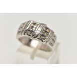 A 9CT WHITE GOLD DIAMOND DRESS RING, designed as three horizontal rows of round brilliant cut