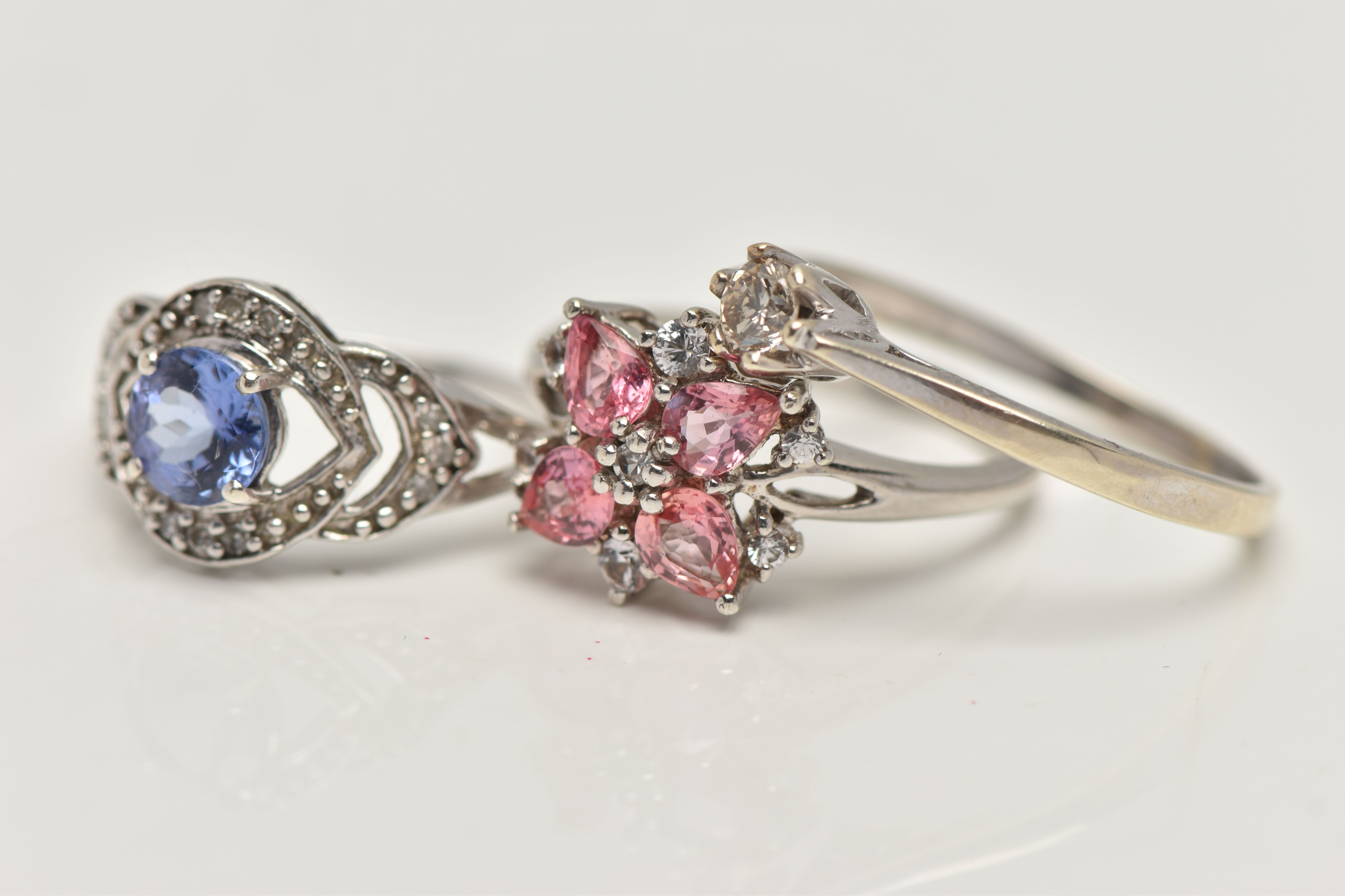 THREE GEM SET RINGS, to include a 9ct white gold single stone diamond ring, round brilliant cut - Image 2 of 4
