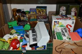 FOUR BOXES OF TOYS AND SOUVENIR DOLLS, to include six Palitoy 'Pocketeers' games, a collection of