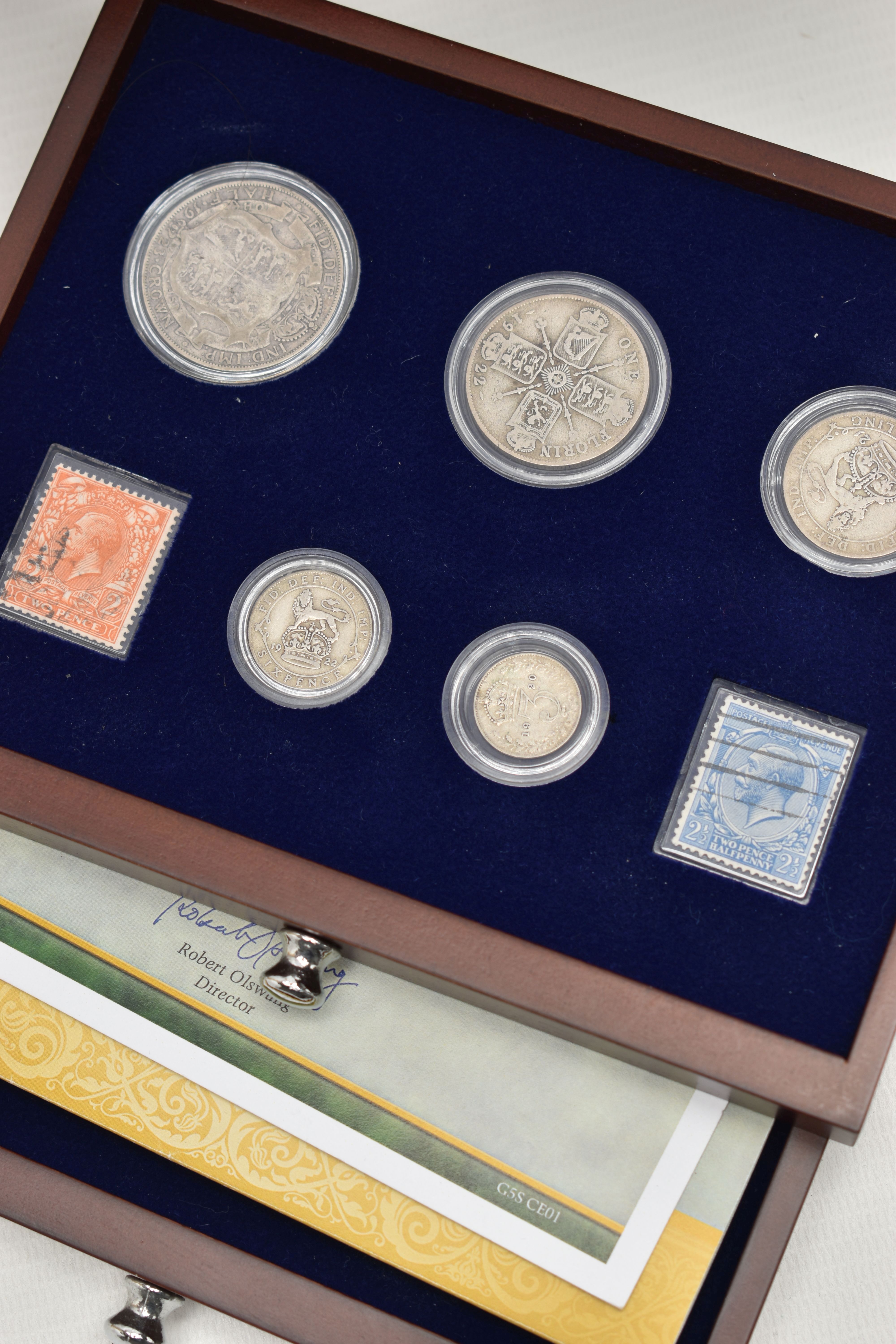 A GLAZED DISPLAY BOX THREE DECADES of GEORGE V STAMP AND COIN SET, to include four trays of silver - Image 18 of 18